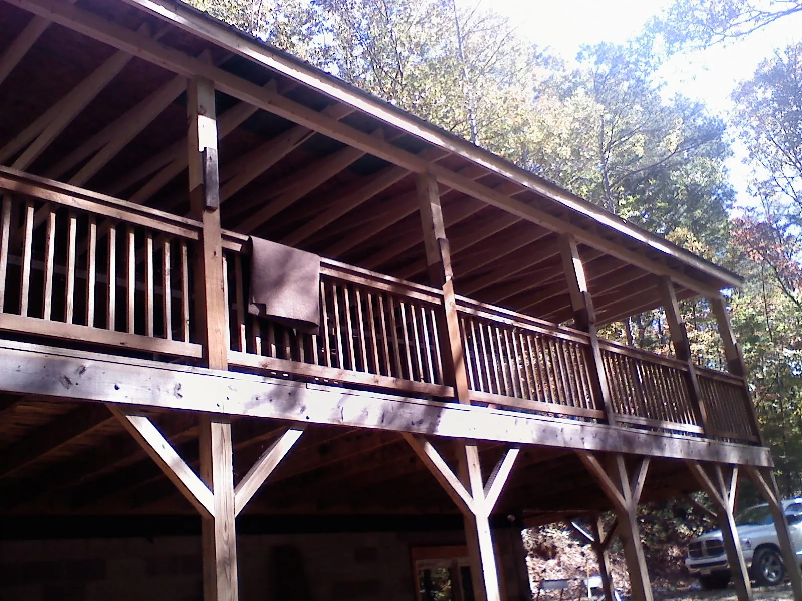 Timber framing under a new elevated porch and deck — Roof Leak Repair in Gates by Roofing Brothers